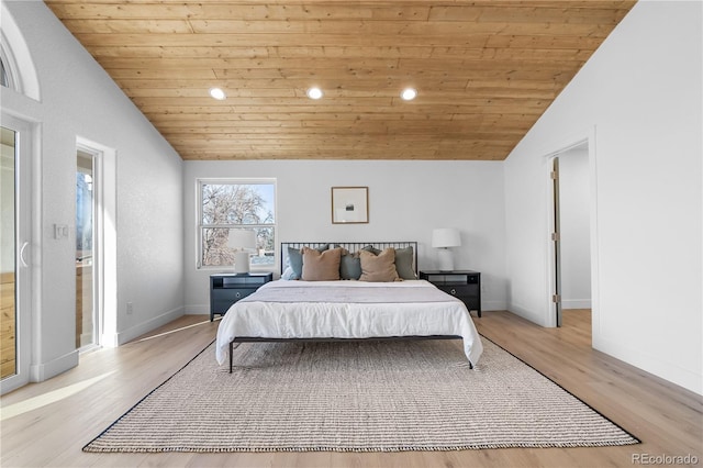 bedroom featuring lofted ceiling, wooden ceiling, and light hardwood / wood-style floors