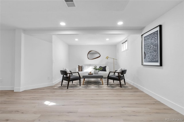 sitting room with light hardwood / wood-style floors