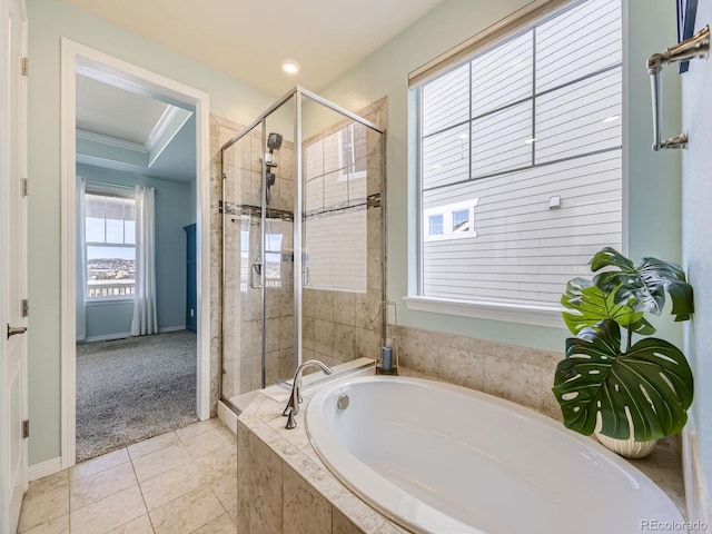 bathroom featuring tile patterned floors, crown molding, and independent shower and bath