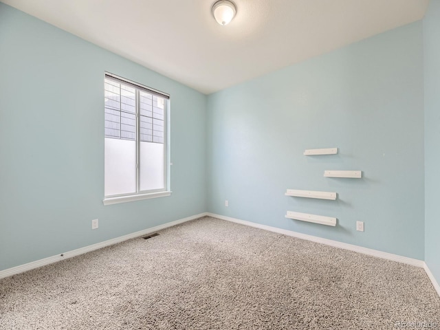 view of carpeted spare room