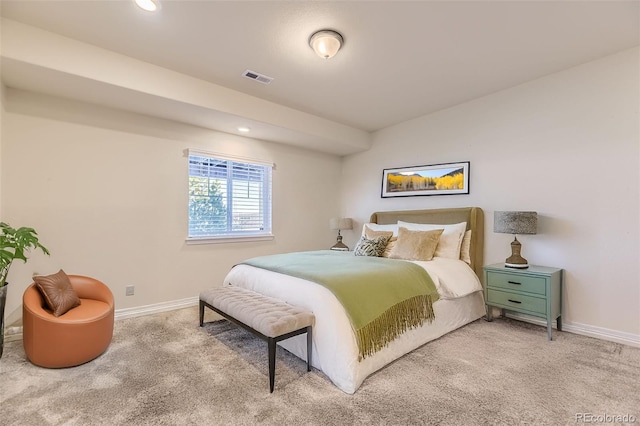 bedroom with light carpet