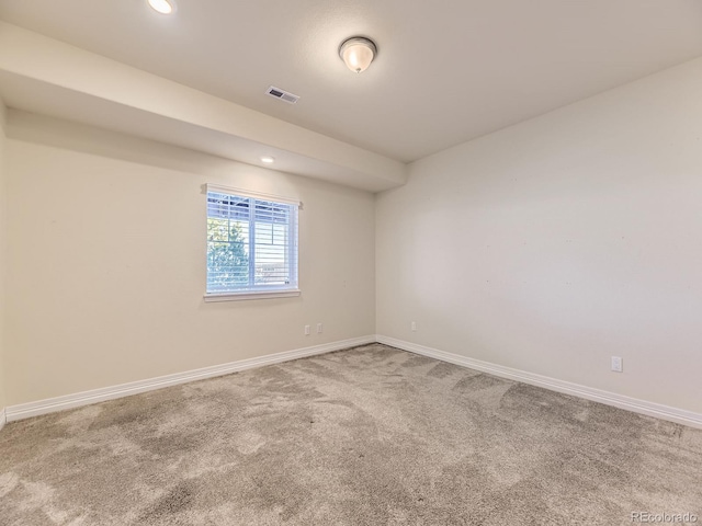 spare room featuring carpet flooring