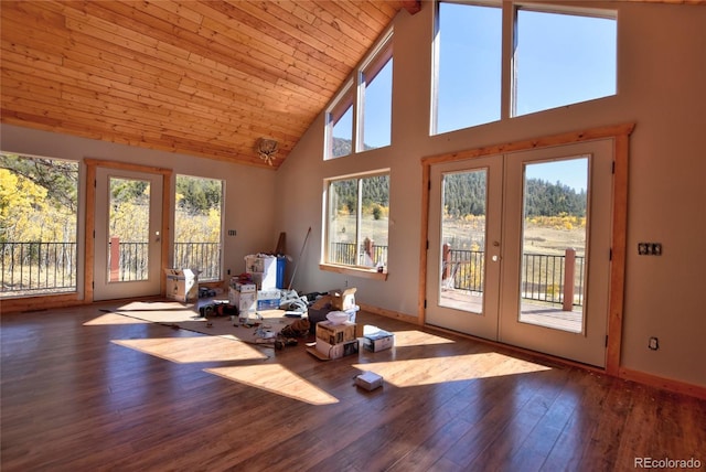 unfurnished sunroom featuring vaulted ceiling and french doors