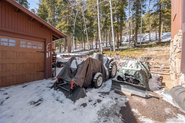 266 Lodgepole Dr, Evergreen, CO 80439 - yard covered in snow with a garage