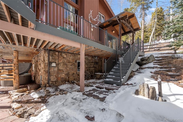 266 Lodgepole Dr, Evergreen, CO 80439 - snow covered property featuring stairway