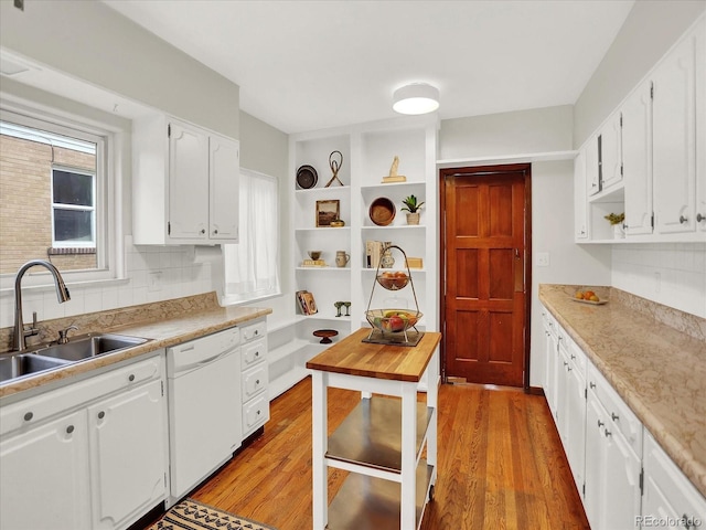 1247 Dexter St, Denver, CO 80220 - kitchen featuring white dishwasher, open shelves, a sink, and light wood-type flooring