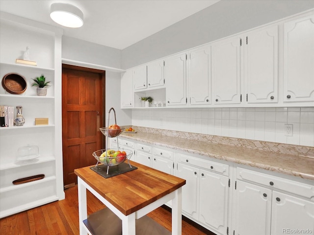 1247 Dexter St, Denver, CO 80220 - kitchen with open shelves, white cabinetry, tasteful backsplash, and dark wood-type flooring