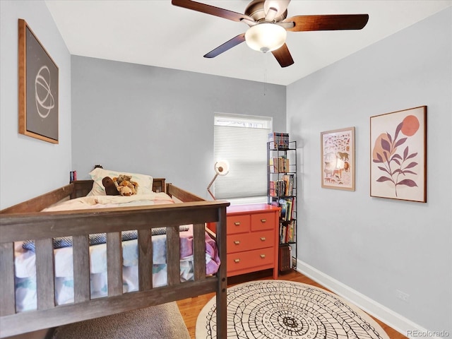 1247 Dexter St, Denver, CO 80220 - bedroom with light wood-style floors, baseboards, and ceiling fan