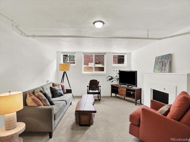 1247 Dexter St, Denver, CO 80220 - carpeted living area with a brick fireplace