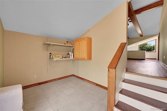 3145 S Bryant St, Sheridan, CO 80110 - stairs with vaulted ceiling and tile patterned flooring