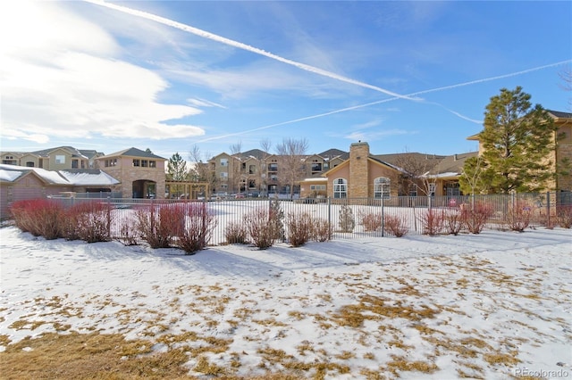 view of yard covered in snow