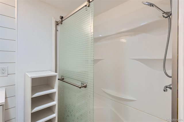 full bathroom featuring a stall shower