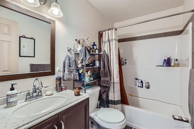 bathroom featuring vanity, toilet, and shower / bath combo with shower curtain