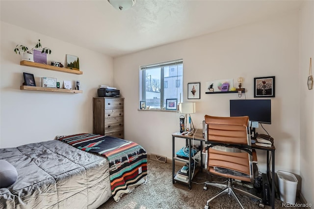 carpeted bedroom with baseboards