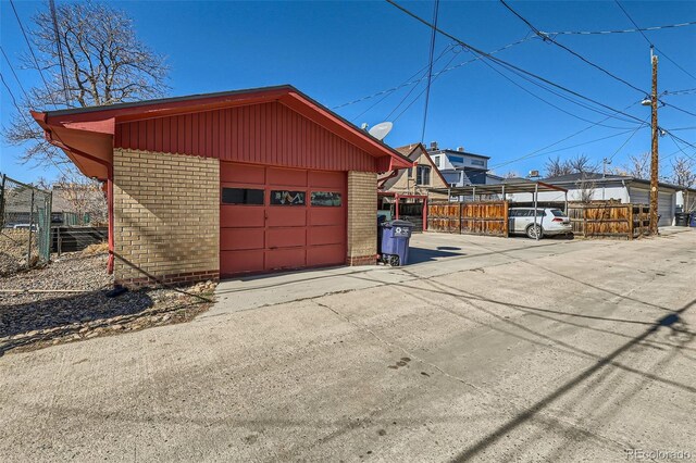 detached garage with fence