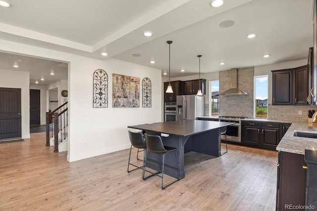 16002 E 111th Cir, Commerce City, CO 80022 - kitchen with stainless steel fridge with ice dispenser, wall chimney exhaust hood, a sink, a kitchen breakfast bar, and decorative backsplash