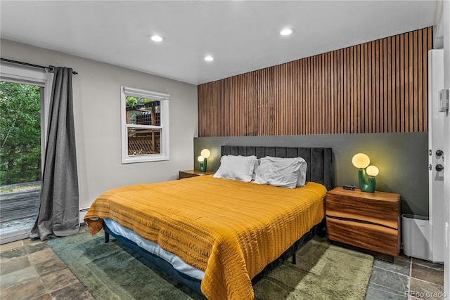 6549 Modoc Ln, Evergreen, CO 80439 - bedroom with stone tile floors, recessed lighting, and a baseboard heating unit