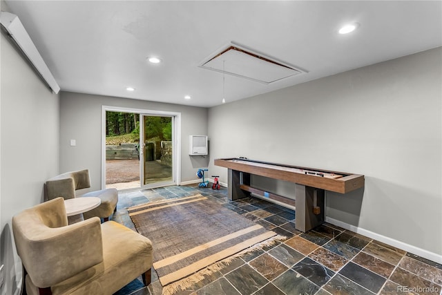 6549 Modoc Ln, Evergreen, CO 80439 - rec room featuring attic access, stone tile floors, and recessed lighting