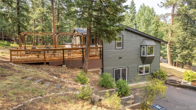 6549 Modoc Ln, Evergreen, CO 80439 - view of home's exterior with a wooden deck