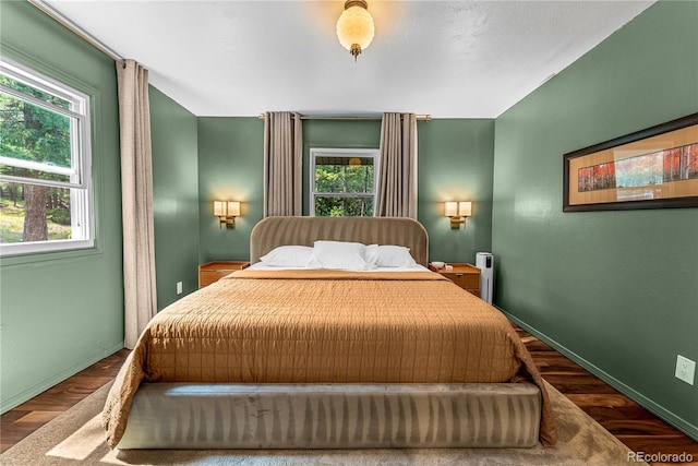 6549 Modoc Ln, Evergreen, CO 80439 - bedroom with wood finished floors and baseboards