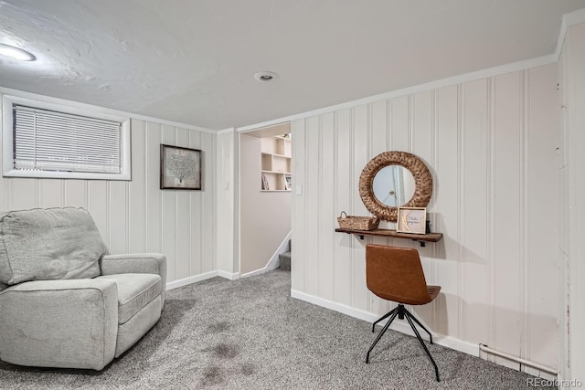 living area with stairway, baseboards, and carpet