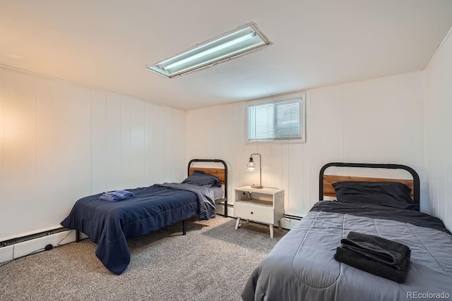 carpeted bedroom featuring a baseboard radiator