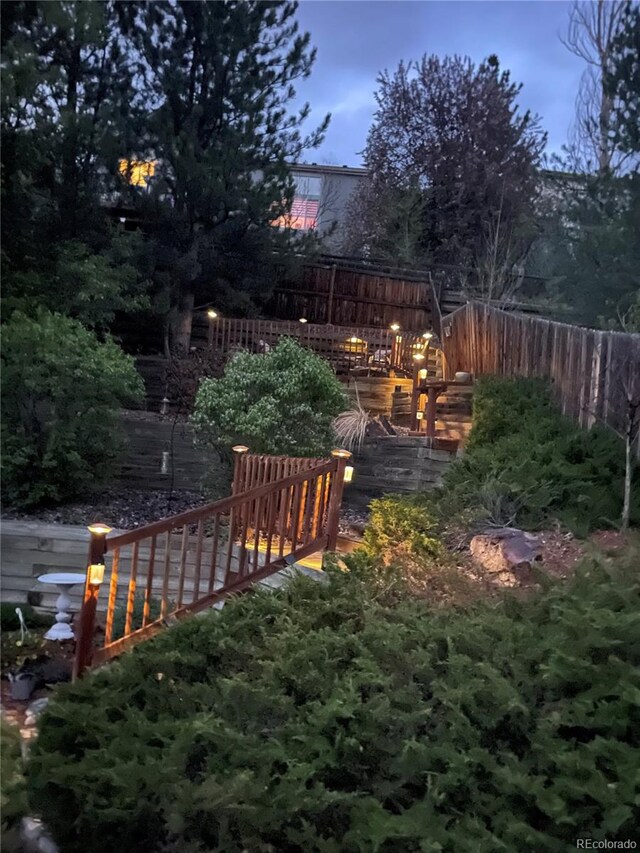 view of yard with a wooden deck
