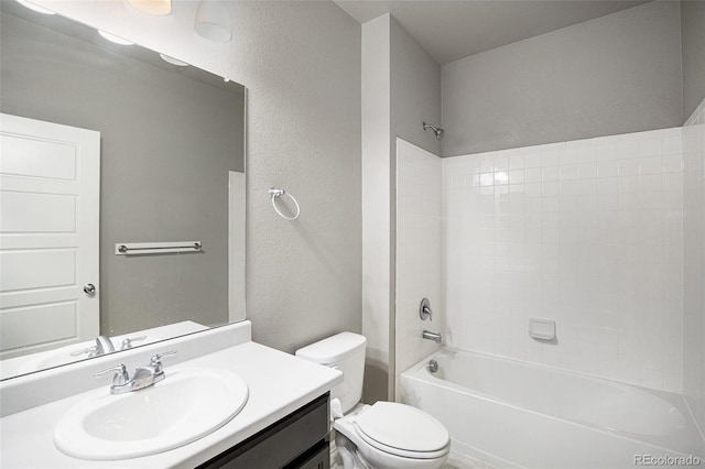 full bathroom featuring vanity, bathing tub / shower combination, and toilet