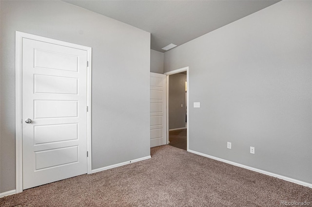 unfurnished bedroom with carpet floors