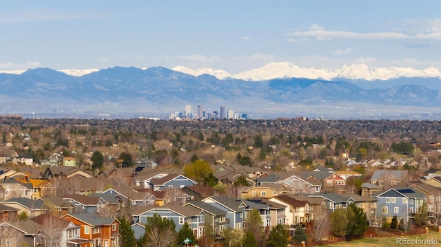 bird's eye view featuring a mountain view and a residential view
