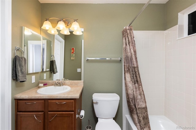 full bathroom featuring vanity, shower / tub combo with curtain, and toilet
