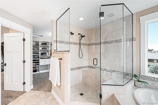 12648 Waterside Ln, Longmont, CO 80504 - full bath with a garden tub, a stall shower, a spacious closet, healthy amount of natural light, and recessed lighting