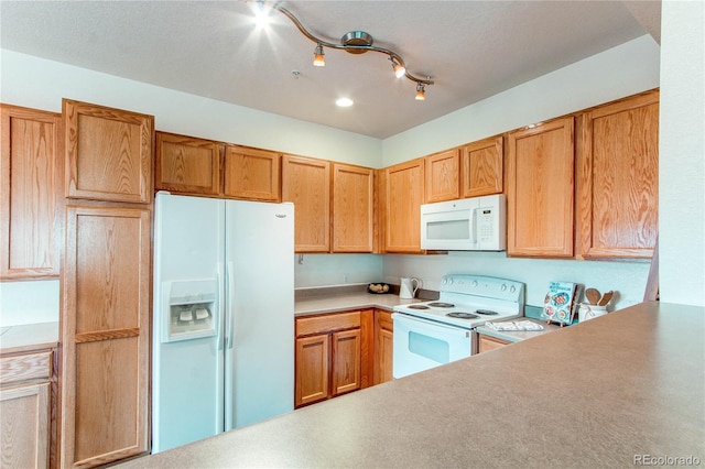 kitchen featuring white appliances