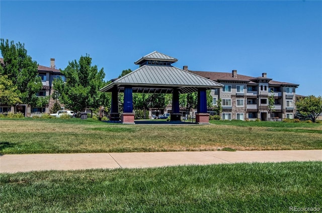 view of community with a gazebo and a lawn