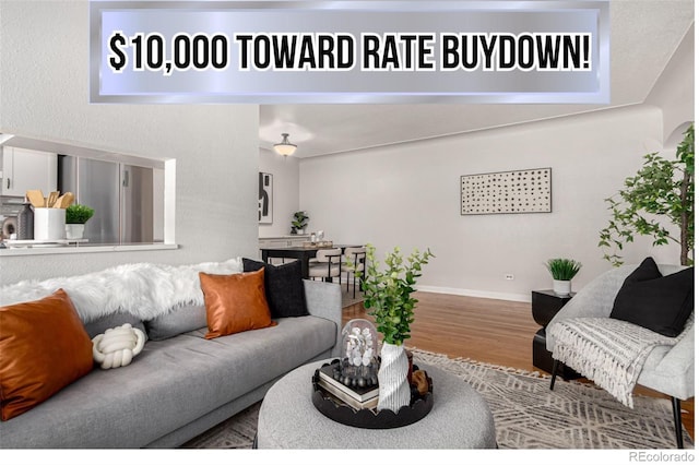 1454 Jersey St Unit 104, Denver, CO 80220 - living room featuring wood finished floors and baseboards