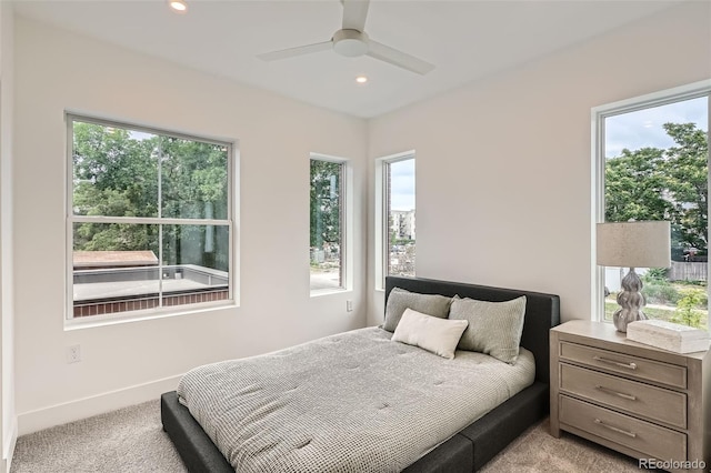 115 W 2nd Ave Unit 101, Denver, CO 80223 - bedroom with multiple windows, light carpet, recessed lighting, and a ceiling fan