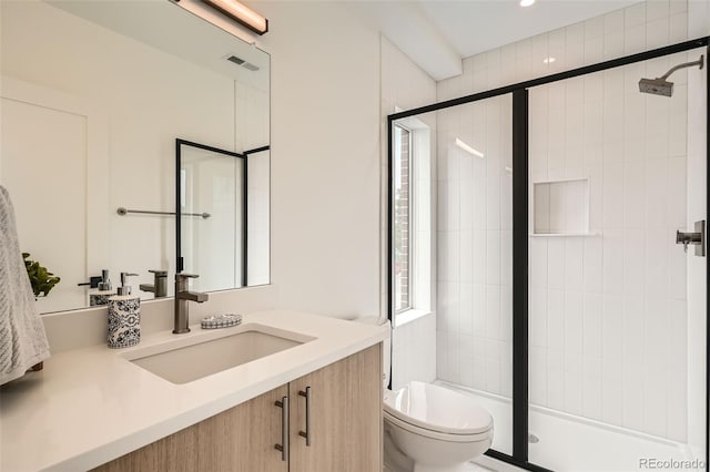 115 W 2nd Ave Unit 101, Denver, CO 80223 - full bath with vanity, a shower stall, and recessed lighting