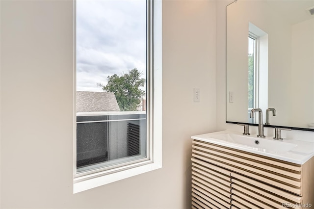115 W 2nd Ave Unit 101, Denver, CO 80223 - bathroom featuring vanity