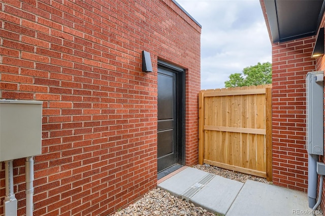 115 W 2nd Ave Unit 101, Denver, CO 80223 - doorway to property with brick siding