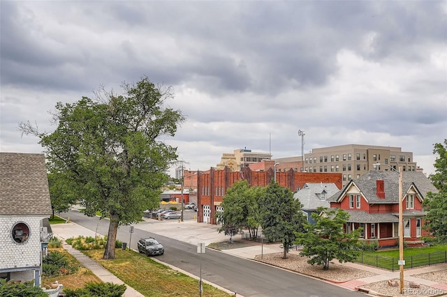 115 W 2nd Ave Unit 101, Denver, CO 80223 - view of asphalt street with sidewalks and curbs