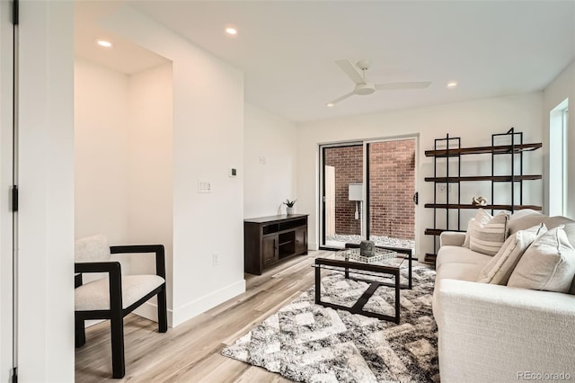 115 W 2nd Ave Unit 101, Denver, CO 80223 - living area with light wood-style floors, ceiling fan, and recessed lighting