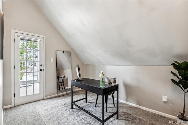 home office with carpet flooring and lofted ceiling