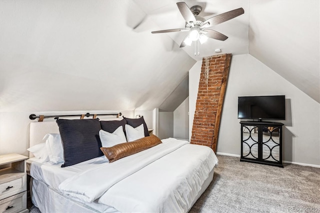 carpeted bedroom featuring lofted ceiling and ceiling fan