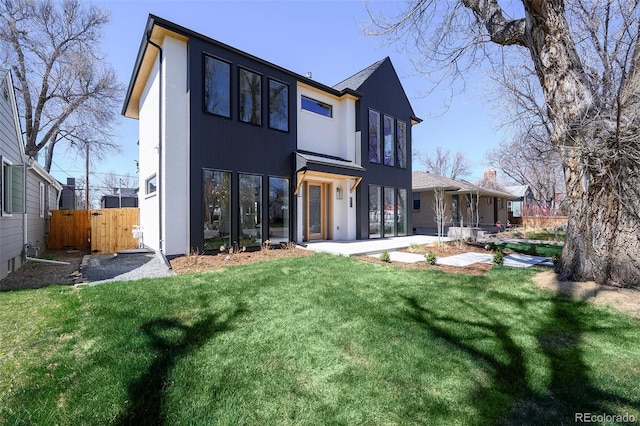 1117 S Madison St, Denver, CO 80210 - rear view of house featuring a gate and a patio area