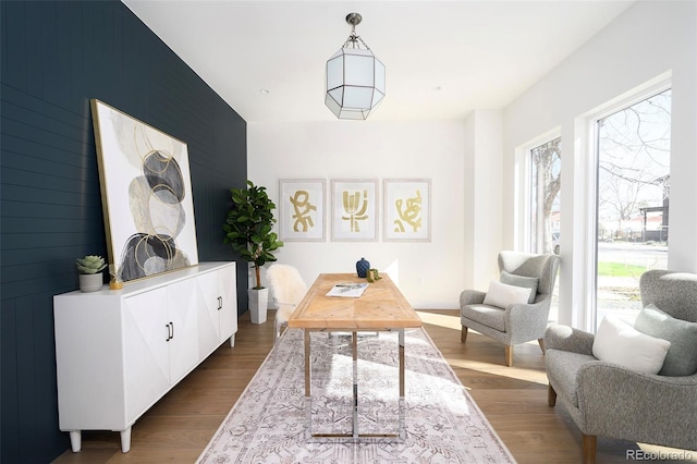 1117 S Madison St, Denver, CO 80210 - office area with dark wood-style flooring and an accent wall