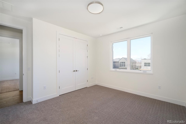 1117 S Madison St, Denver, CO 80210 - unfurnished bedroom featuring carpet and baseboards