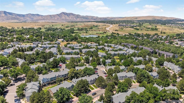 drone / aerial view with a residential view and a mountain view