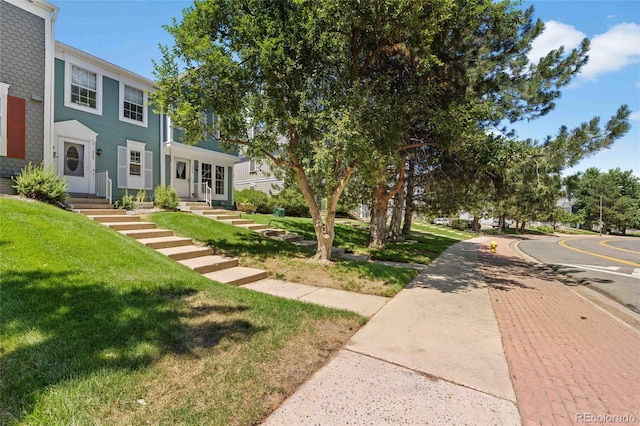 view of front of property with a front lawn