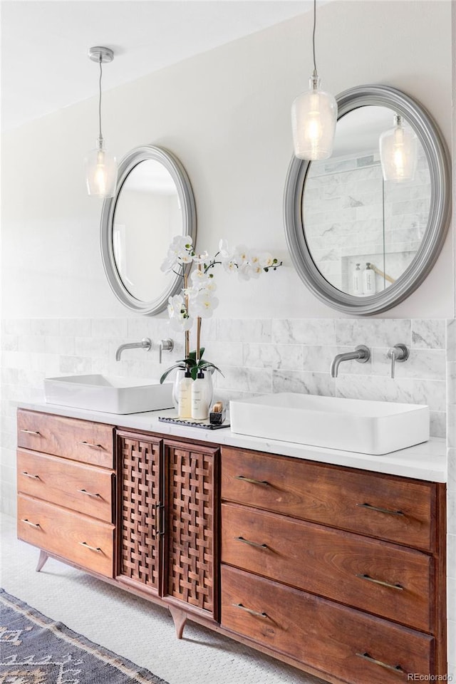 full bathroom featuring tile walls and vanity