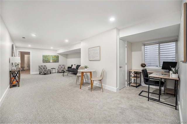 carpeted office space with baseboards and recessed lighting
